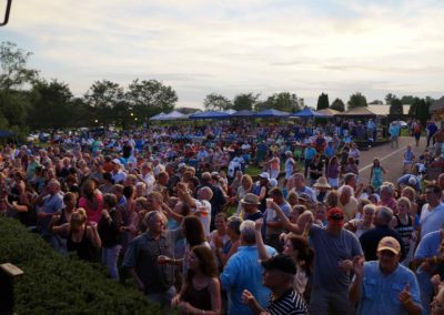 Experience the sense of community and camaraderie that fills the air at Equus Run Vineyards' summer concert series, as thousands of music lovers unite to celebrate their shared passion for big band performances.