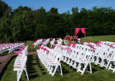Discover the charm and allure of our outdoor amphitheater wedding venue, where rustic elegance, breathtaking views, and the sounds of nature combine to create an idyllic setting.