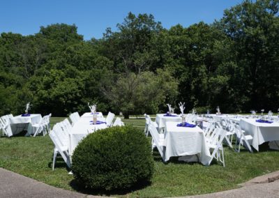 Admire the elegance of the set-up, as rows of beautifully adorned chairs await guests, ready to witness and celebrate the precious moments of a wedding at Equus Run Vineyards.