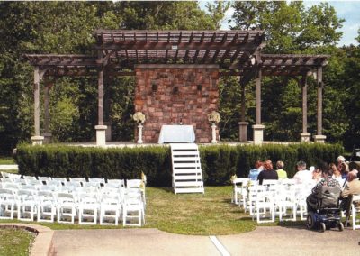 Embrace the serenity of our outdoor wedding venue captured in an image of empty chairs, awaiting the joyful union of two souls amidst the picturesque surroundings of Equus Run Vineyards.